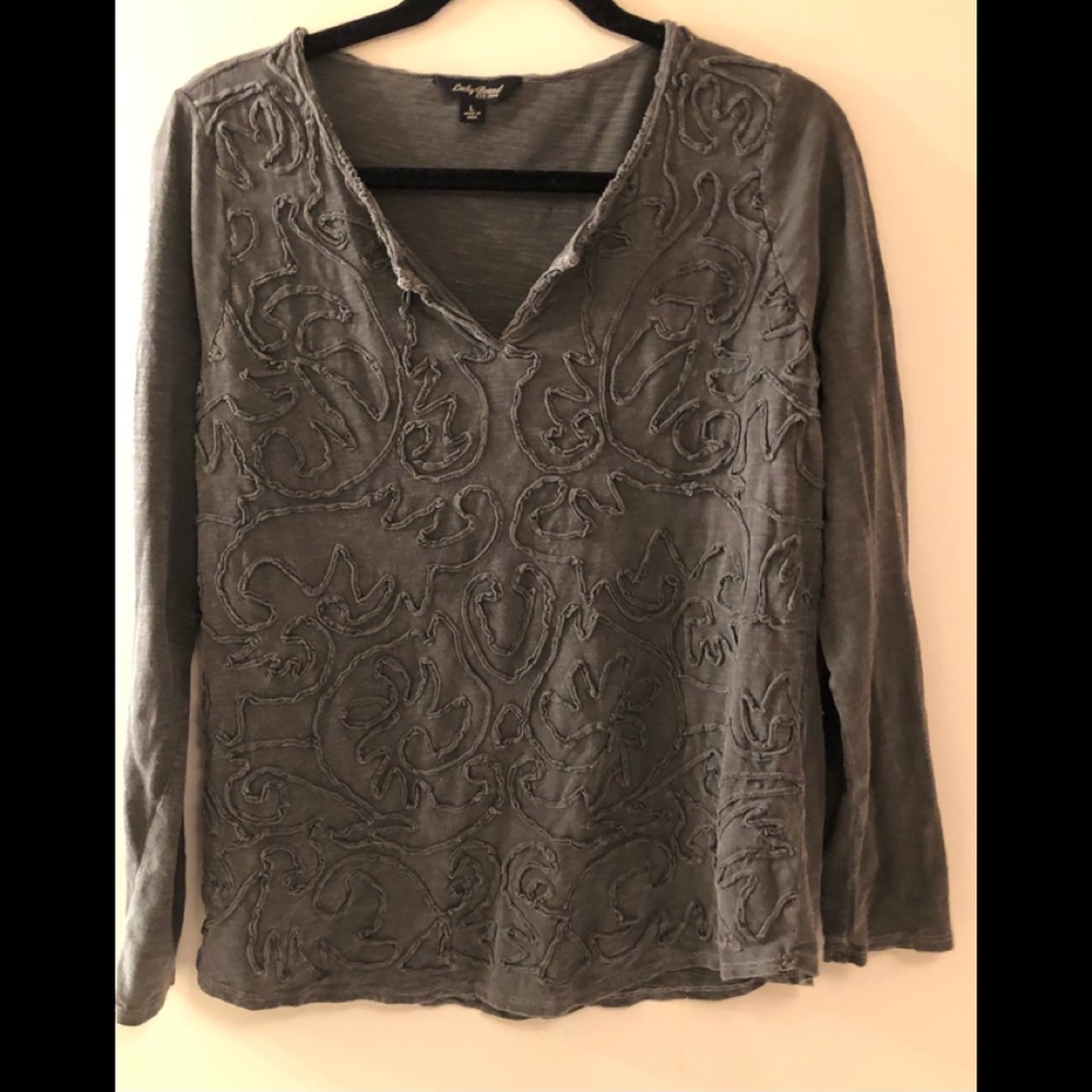 size L LuckyBrand top with add decorative design on front.